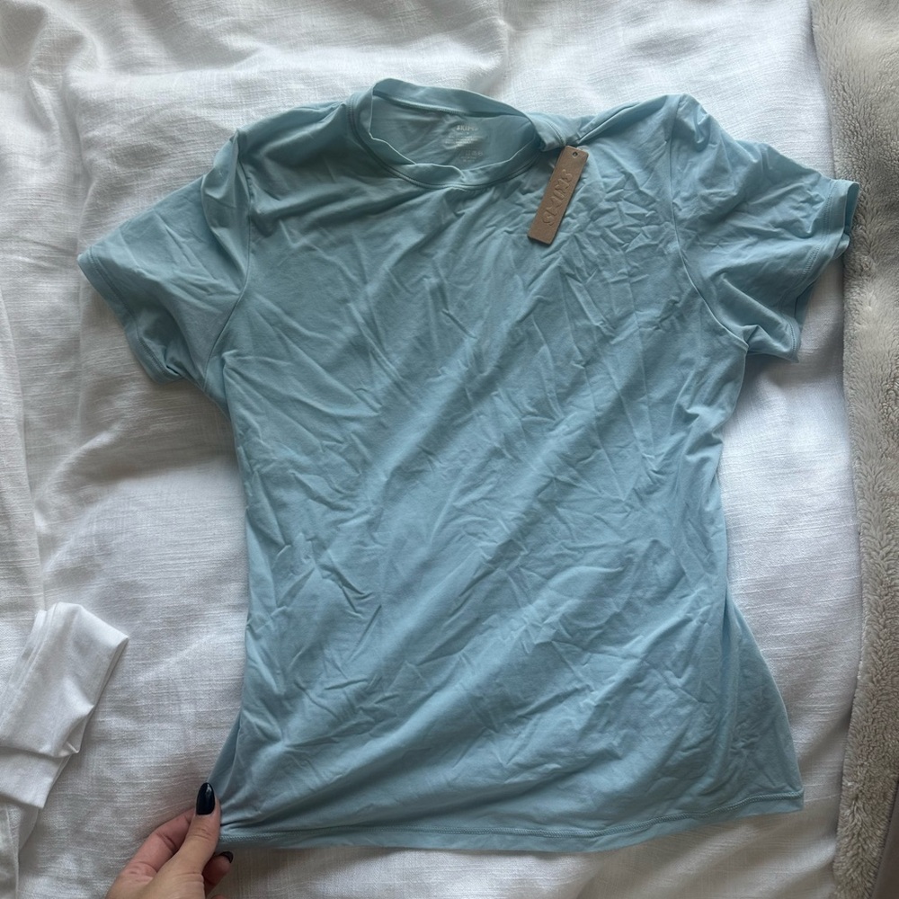 Skims Sky blue contour top NWT